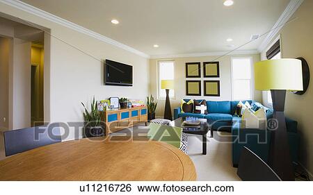 Stock Photograph - Contemporary living space with natural light. Fotosearch