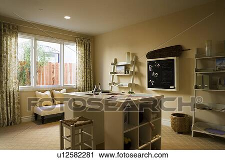 Craftroom with built in craft table and shelves View Large Photo Image Stock Image - Craftroom with built in craft table and shelves. Fotosearch