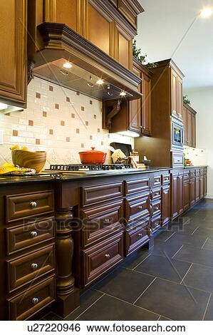 Custom kitchen cabinetry with hood View Large Photo Image Stock Photograph - Custom kitchen cabinetry with hood. Fotosearch