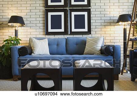 Detail of living room couch with foot stools View Large Photo Image Picture - Detail of living room couch with foot stools. Fotosearch