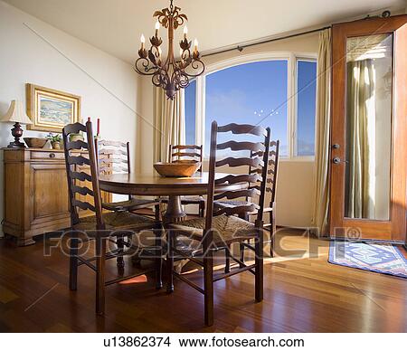 Interior of a traditional breakfast nook in the evening View Large Photo Image Picture - Interior of a traditional breakfast nook in the evening. Fotosearch
