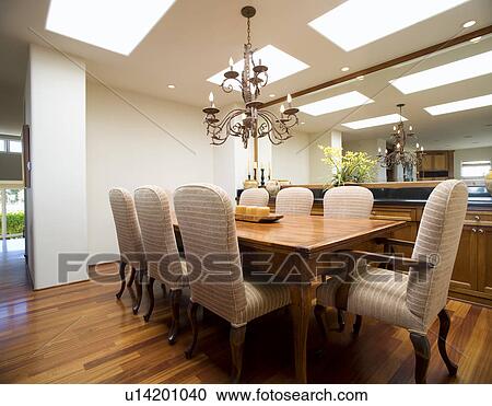 Stock Image - Interior of a traditional dining room. Fotosearch