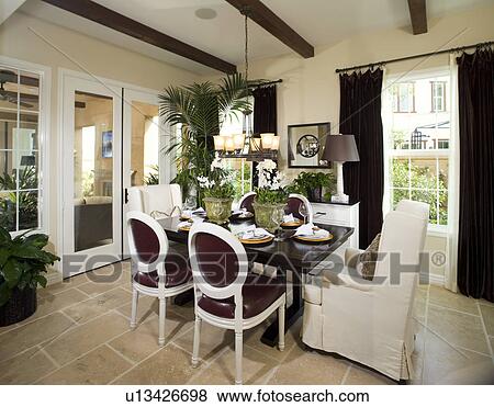 Interior of a traditional dining room View Large Photo Image Stock Photo - Interior of a traditional dining room. Fotosearch