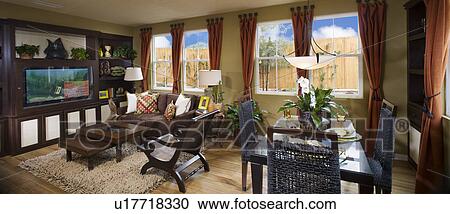 Stock Image - Interior of contemporary dining room and living room. Fotosearch