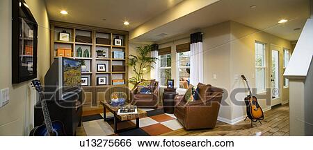 Stock Photograph - Interior of entertainment room and patio. Fotosearch