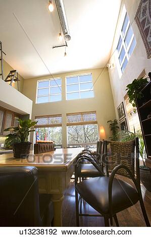 Stock Image - Low angle view of dining and living room. Fotosearch