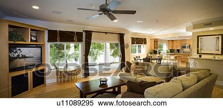 View of living room, dining room, and kitchen View Large Photo Image Stock Photography - View of living room, dining room, and kitchen. Fotosearch