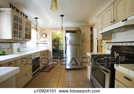 Stock Image - Wide angle image of kitchen. Fotosearch