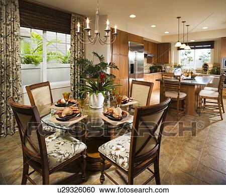 Stock Image - Contemporary Kitchen and Dining Room. Fotosearch