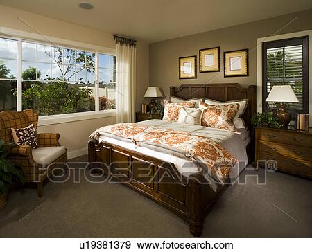 Cozy Bedroom with Orange Details View Large Photo Image Stock Photo - Cozy Bedroom with Orange Details. Fotosearch
