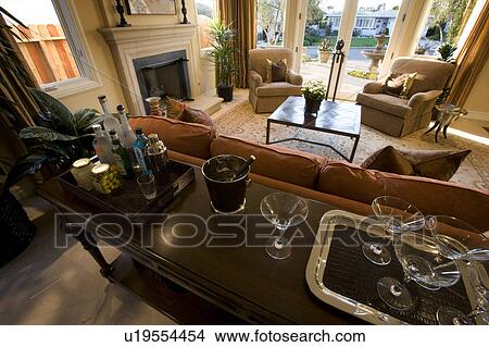 Living Room Scene with Martini Ingredients in Foreground View Large Photo Image Picture - Living Room Scene with Martini Ingredients in Foreground. Fotosearch