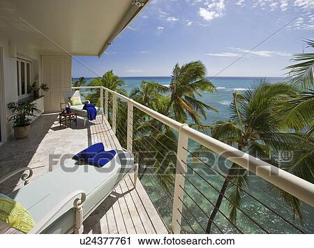 Stock Image - Balcony overlooking Ocean. Fotosearch