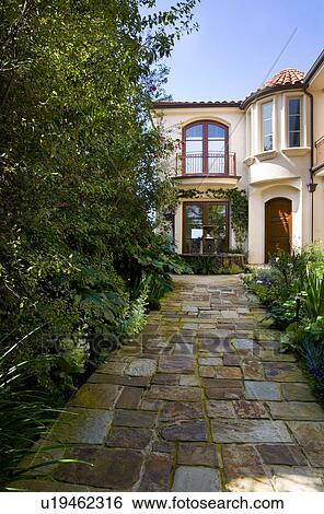 Front Exterior of Spanish Home with Fountain View Large Photo Image Stock Photograph - Front Exterior of Spanish Home with Fountain. Fotosearch