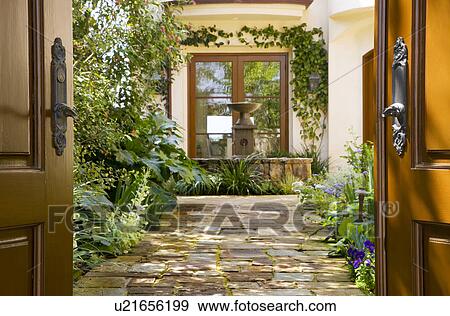 Front Gate Open to Home Courtyard View Large Photo Image Stock Photo - Front Gate Open to Home Courtyard. Fotosearch