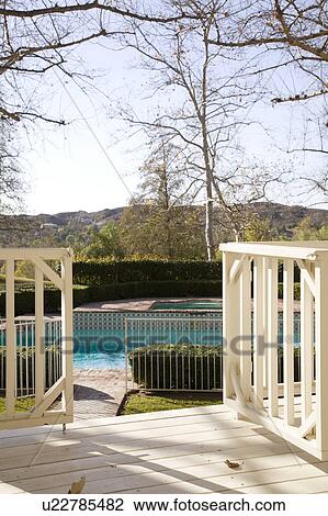 Porch Gate and Path to Pool View Large Photo Image Stock Image - Porch Gate and Path to Pool. Fotosearch