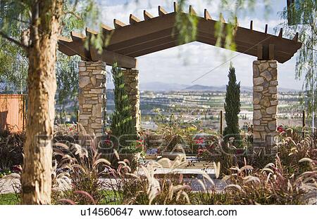 Professional Landscaping and Arbor with Scenic View View Large Photo Image Stock Photo - Professional Landscaping and Arbor with Scenic View. Fotosearch