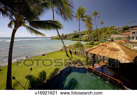 Stock Image - View from Above of Pool and Jacuzzi with Cabana. Fotosearch