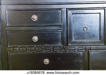 Stock Photo - Black Wood Dresser Detail. Fotosearch