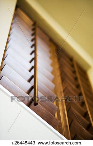 Stock Image - Dark Wood Shutters on Window. Fotosearch