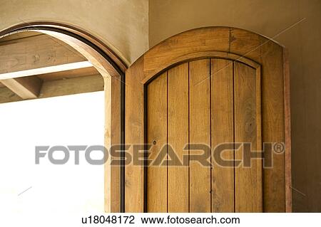 Detail of an open wood door View Large Photo Image Stock Image - Detail of an open wood door. Fotosearch