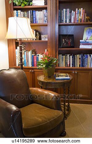 Detail of brown leather chair and light in study View Large Photo Image Stock Photo - Detail of brown leather chair and light in study. Fotosearch