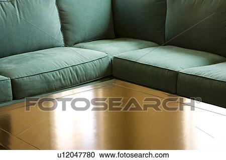 Green sectional couch and wood table View Large Photo Image Stock Image - Green sectional couch and wood table. Fotosearch