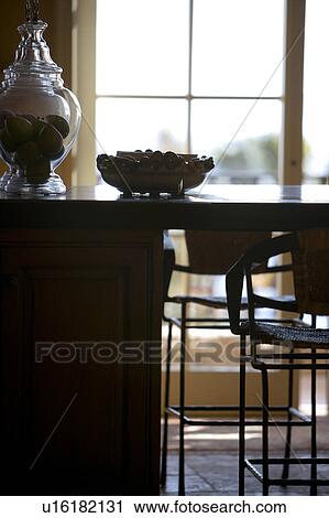 Stock Image - Silhouette of Kithen Counter and Stools. Fotosearch