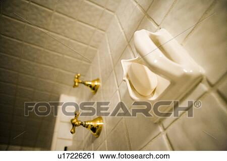 Stock Image - Tile Shower with Soap Dish and Brass Knobs. Fotosearch