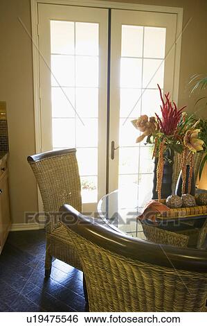 Wicker dining chairs View Large Photo Image Stock Photograph - Wicker dining chairs. Fotosearch