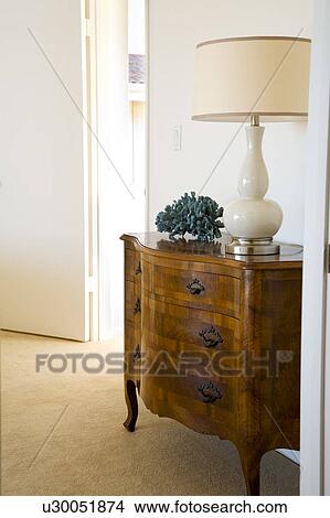 Picture - Wood Dresser and Lamp. Fotosearch