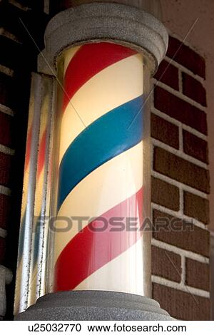 Stock Image - Barber poll on Corey Avenue. St Pete Beach Tampa Bay Area Florida USA. Fotosearch