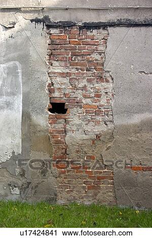 Bricks escaping from cement facade. Lodz Central Poland View Large Photo Image Stock Image - Bricks escaping from cement facade. Lodz Central Poland. Fotosearch