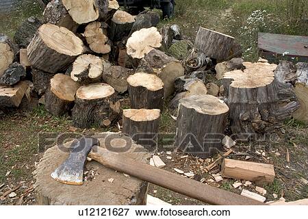 Chopping wood located at the site of a mock up of a military mess hall in Poland where soup and bread is served. Rawa Mazowieck View Large Photo Image Stock Photo - Chopping wood located at the site of a mock up of a military mess hall in Poland where soup and bread is served. Rawa Mazowieck. Fotosearch