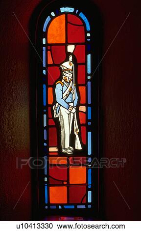 Stock Image - Soldier from revolutionary war on stained glass window. Ft Snelling State Park Minnesota USA. Fotosearch