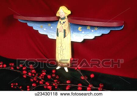 Still life of an angel standing with wings out. St Paul Minnesota USA View Large Photo Image Stock Photo - Still life of an angel standing with wings out. St Paul Minnesota USA. Fotosearch