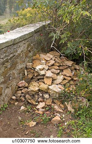 The Stone fence and pile of flagstone View Large Photo Image Stock Image - The Stone fence and pile of flagstone. Fotosearch