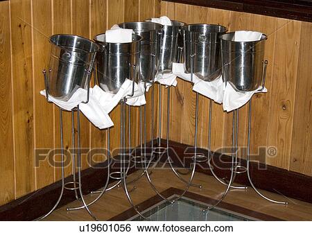 Stock Photograph - Wine chiling stands. Fotosearch