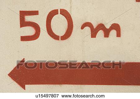 Stock Photo - Arrow, Distance Sign, Day, Close-Up, 50. Fotosearch