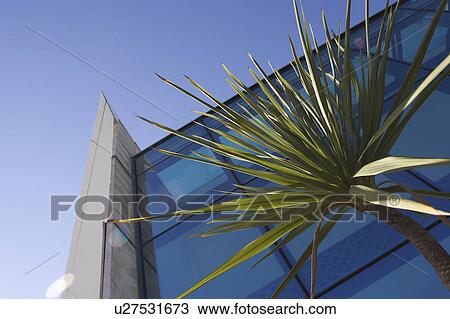 Stock Image - Blue, Building Exterior, Building Structure, Clear Sky, Close-Up. Fotosearch