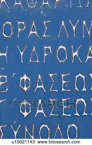 Stock Image - Blue, Colored Background, Close-Up, Capital Letter, Alphabet. Fotosearch