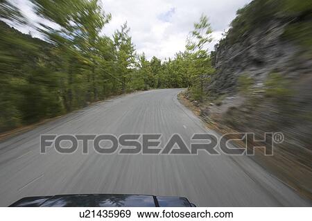 Stock Photo - Blurred Motion, Bonnet, Car, Cloud, Day. Fotosearch