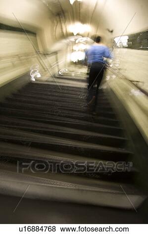 Blurred Motion, Button Down Shirt, Climbing, Defocused, Indoors View Large Photo Image Stock Photo - Blurred Motion, Button Down Shirt, Climbing, Defocused, Indoors. Fotosearch