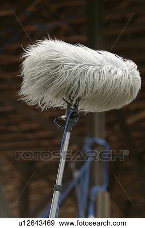 Stock Photo - boom, set, movie, entertainment, production, recording. Fotosearch