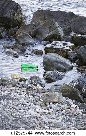 Picture - Bottle, Day, Rock, Outdoors. Fotosearch