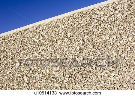 Stock Image - Brown, Building Exterior, Building Structure, Clear Sky, Day. Fotosearch