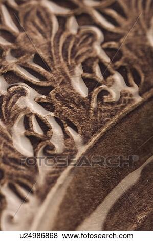 Stock Photo - Brown, Carving, Ceramics, Close-Up, Full Frame. Fotosearch