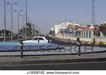 Stock Image - Building Exterior, Day, Car, Building Structure, Advertisement. Fotosearch
