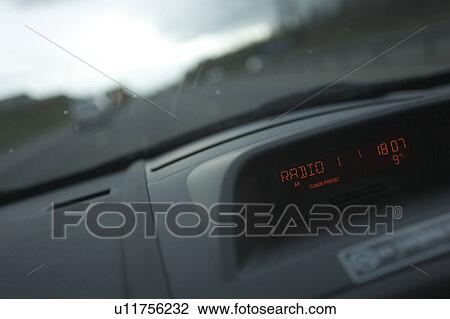 Stock Image - Capital Letter, Car, Close-Up, Dashboard, Day. Fotosearch