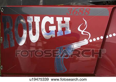 Stock Photo - Capital Letter, Car Door, Close-Up, Design, Gun. Fotosearch