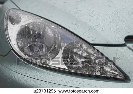 Stock Photography - car, vehicle, headlights, automobile, raindrops, drops. Fotosearch